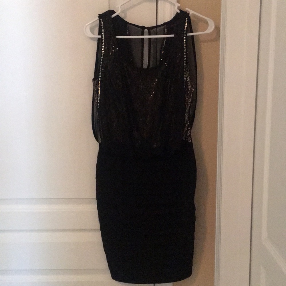 Elegant black and gold sequin dress